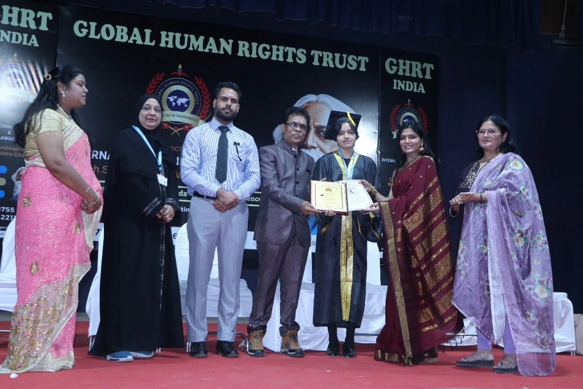 Angel Malewar receiving an award at a Global Human Rights Trust event